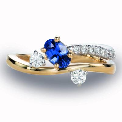Bicolor Gouden ring gezet met blauwe saffier en natuurlijke diamant