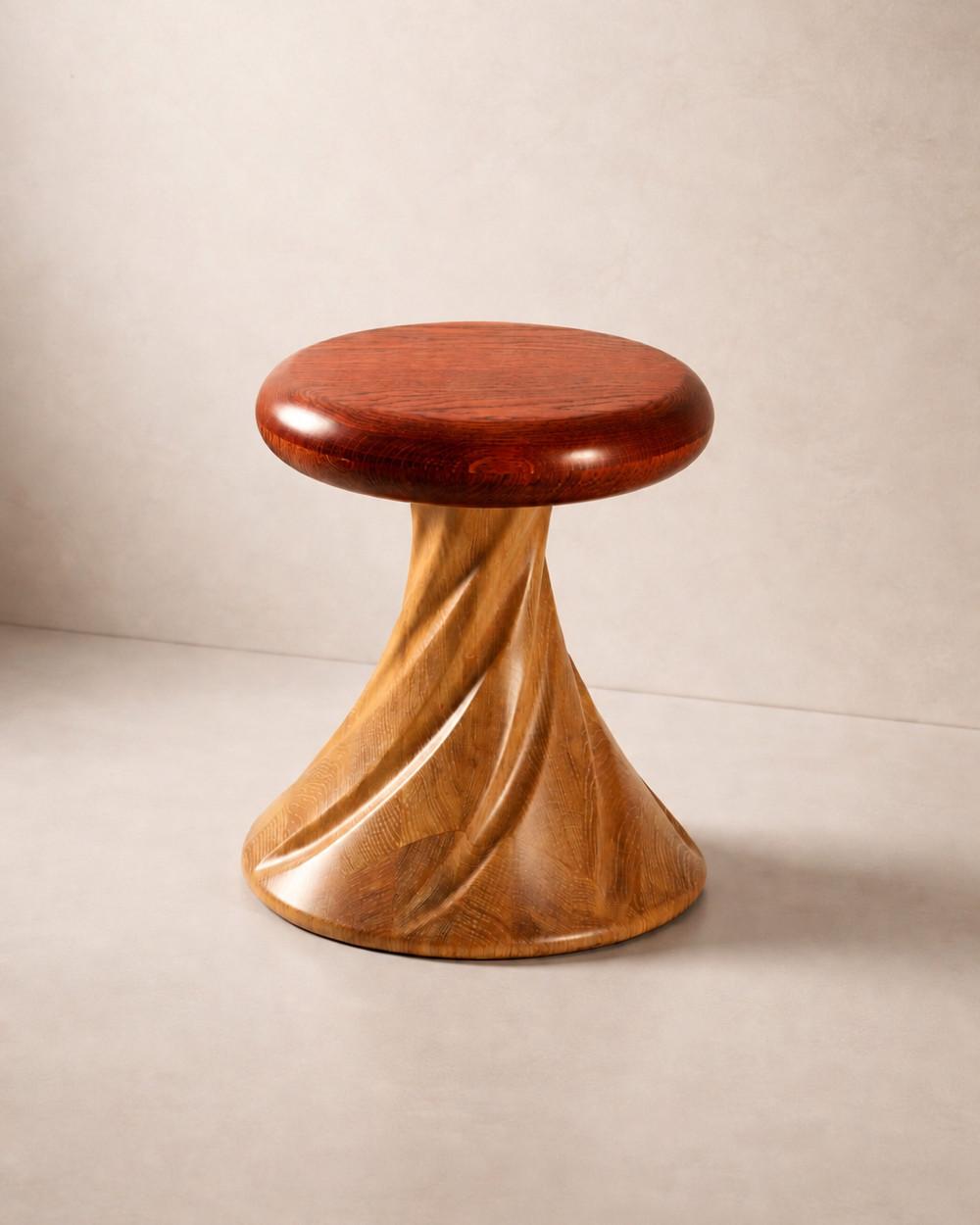 Hera by NEXART — A wooden stool with a rounded seat and a twisting sculptural base
