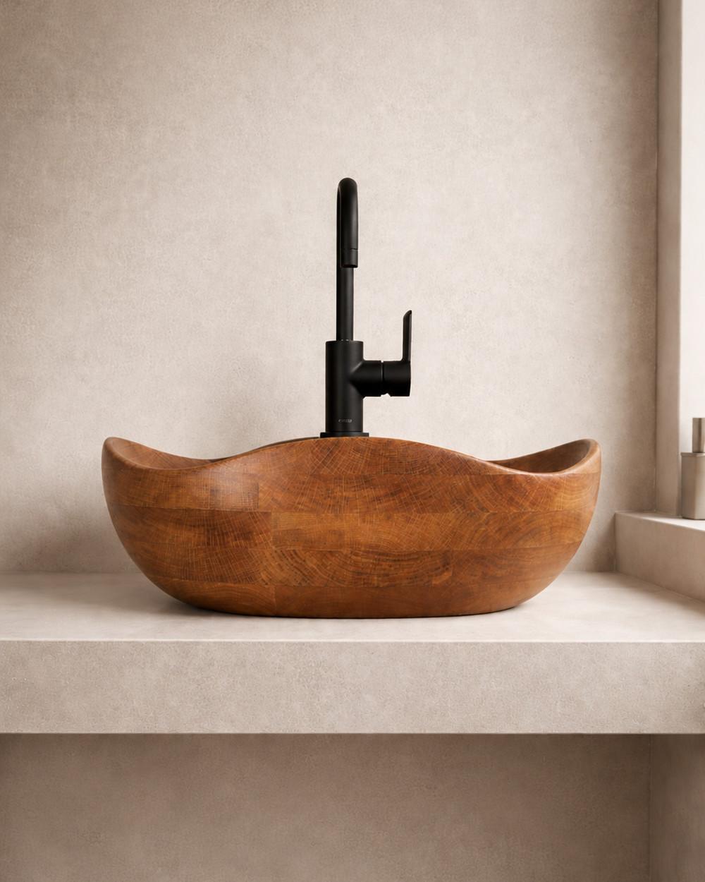 Vesta by NEXART — A rounded wooden washbasin with an organic rim and a warm natural character