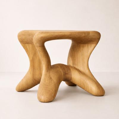 Aura by NEXART — A wooden stool with an organic seat and an open, flowing base