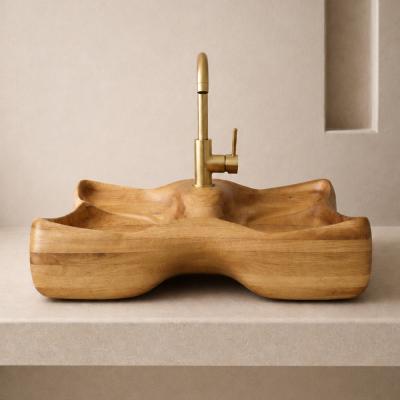 Diana by NEXART — A sculptural wooden washbasin with flowing contours and a distinctive double-bowl form