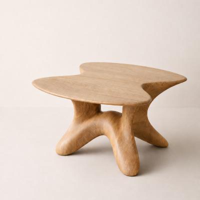 Selene by NEXART — A sculptural wooden coffee table with an organic top and softly curved legs
