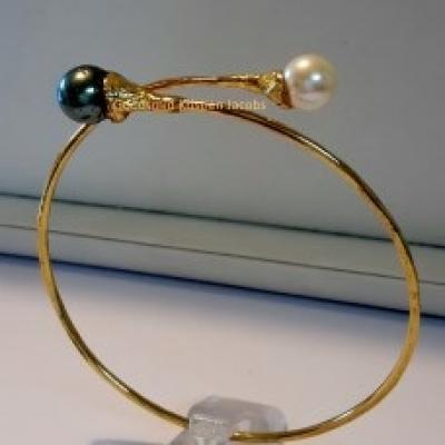 Vaste armband in geel goud met Tahitiparel en zoetwater parel