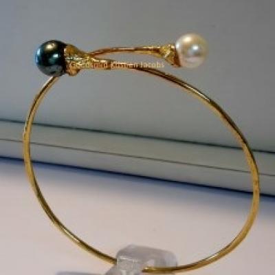 Vaste armband in geel goud met Tahitiparel en zoetwater parel