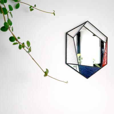 Spiegel in glas-in-koper techniek